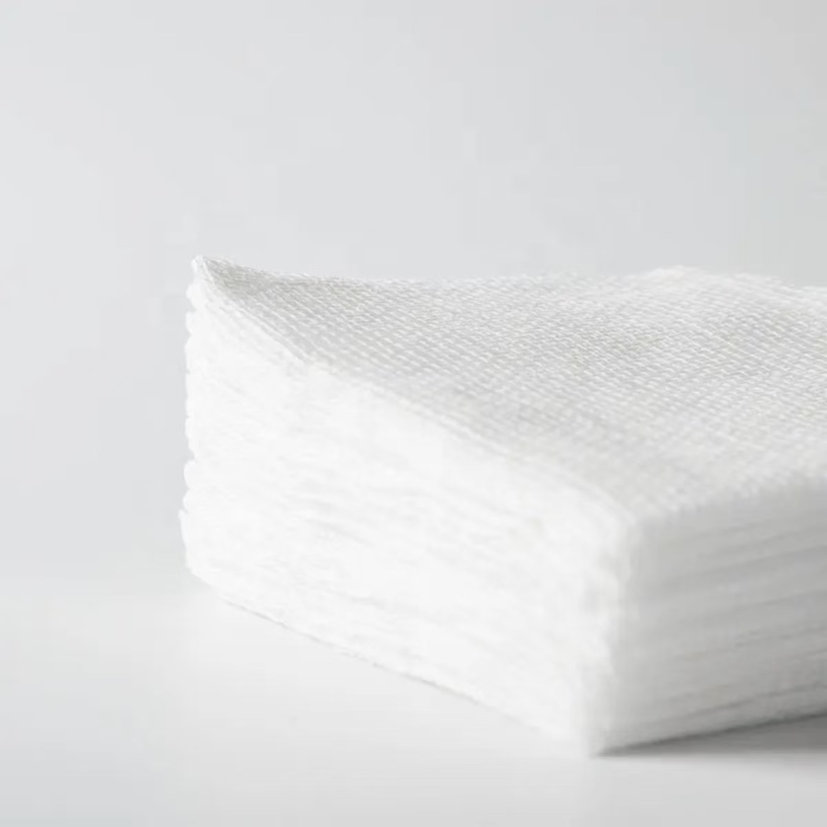 Absorberende bomullsskjæringsbind